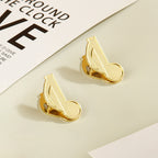 Two vintage gold eighth note metal clips designed for aesthetic planner organization.