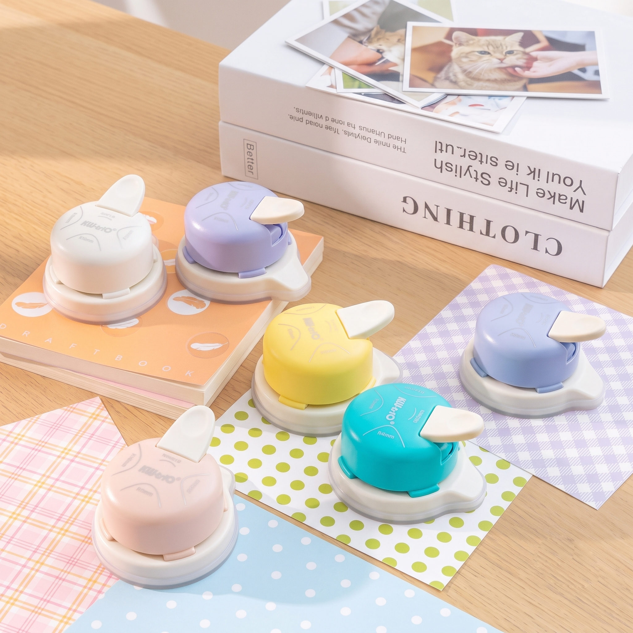 4-in-1 corner rounder six colors flatlay white purple yellow blue teal pink craft desk photos box