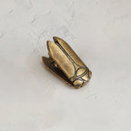 Single Aged Antique Bronze vintage cicada metal paper clamp. A heavy-duty antique style book holder clip for Dark Academia desk setups.