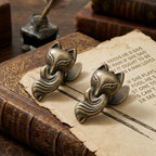Set of 2 Aged Antique Bronze vintage fox journal clips securing a vintage book page. Essential junk journal tools for taming thick and chunky notebooks.
