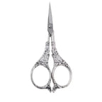 Antique silver lily scissors with intricate lily handle design