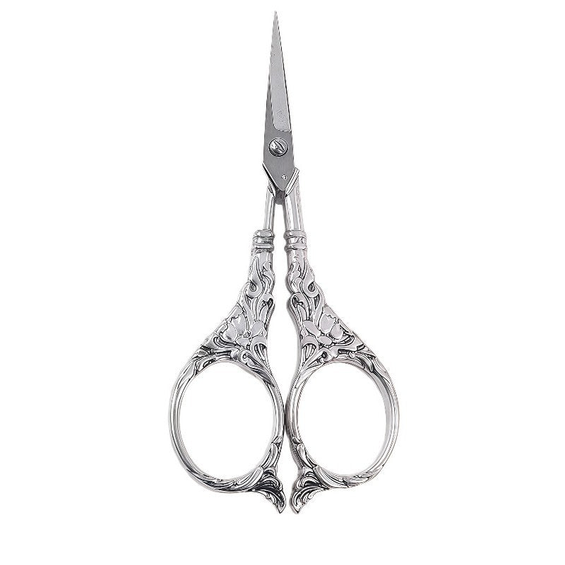 Antique silver lily scissors with intricate lily handle design
