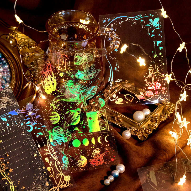 Aesthetic flat lay of vintage celestial and floral junk journal supplies including stickers and papers