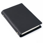 Black crazy horse leather A5 notebook with brass ring binder and vintage patina cover.