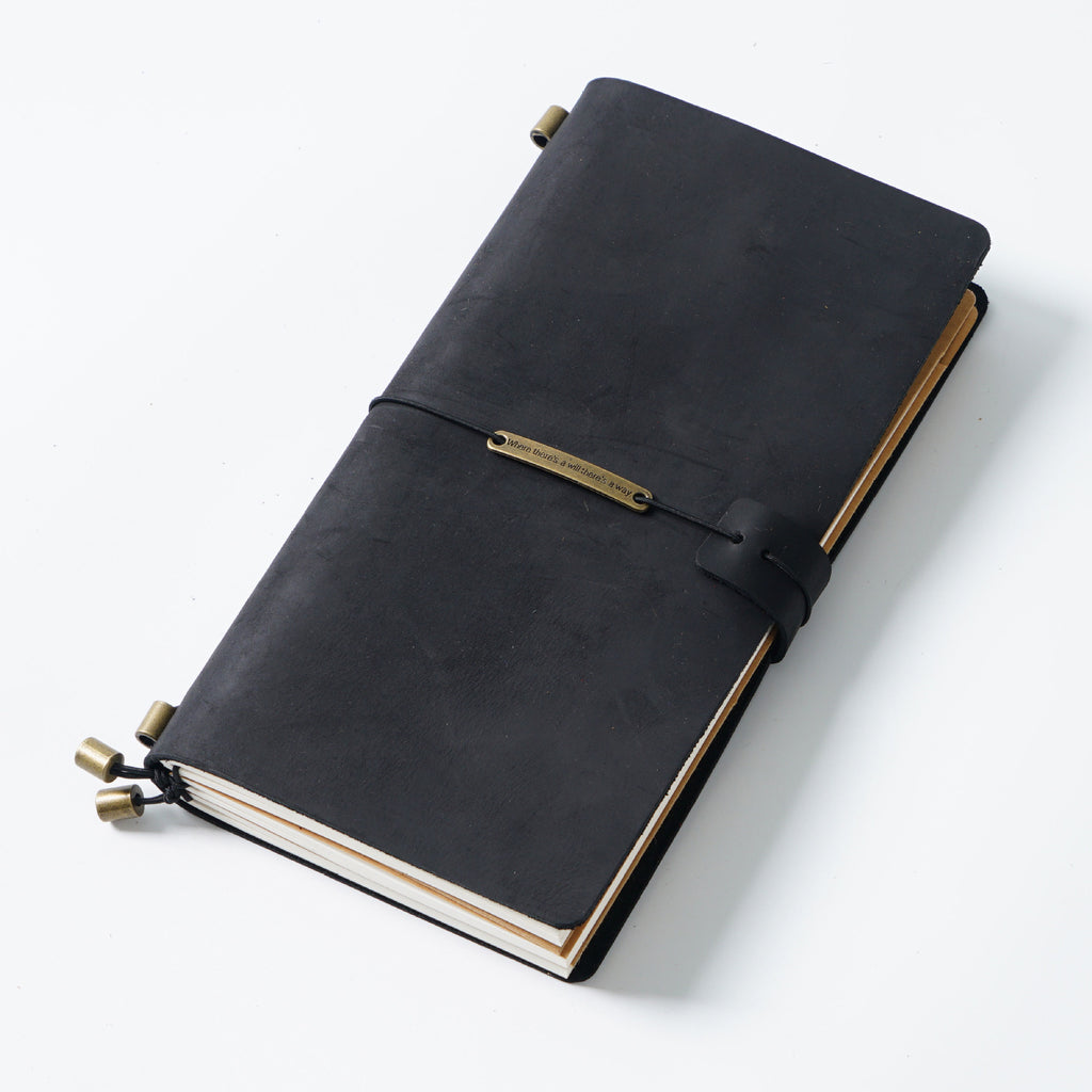 Black crazy horse leather traveler's notebook with elastic band and tassel