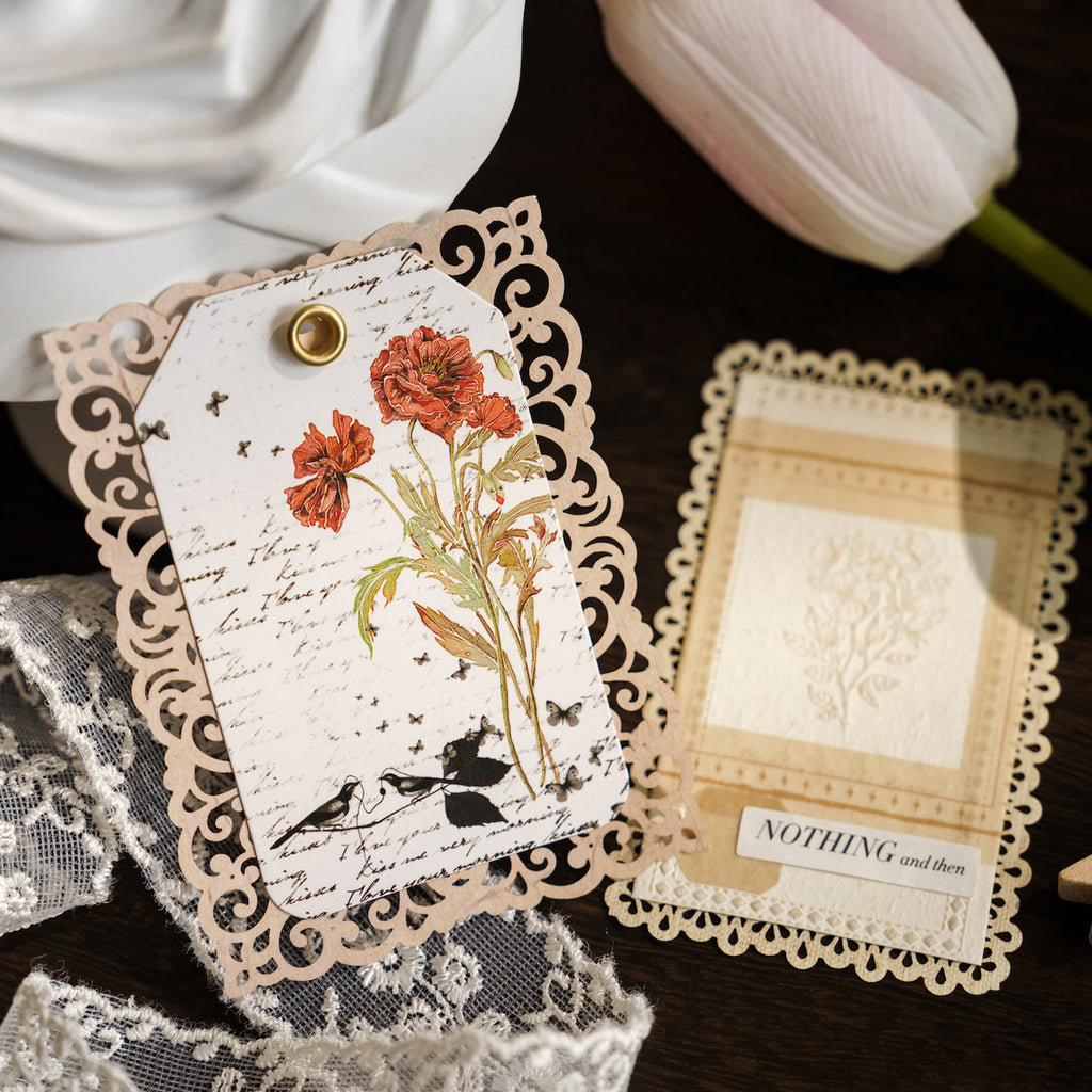 Detailed view of laser-cut lace memo pad designs perfect for journaling and collage