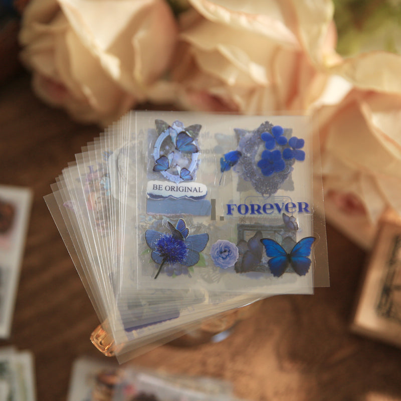 Image of blue floral vintage stickers with butterfly and Be Original Forever text, transparent PET waterproof pieces for dark academia journal decoration
