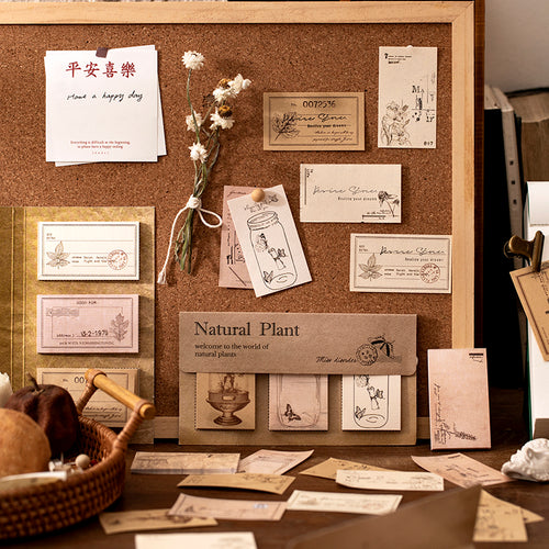 Close-up of botanical sticky notes showing vintage plant designs with kraft and washi paper textures
