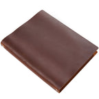 Brown crazy horse leather A4 notebook cover with 2-ring binder and natural waxed texture.