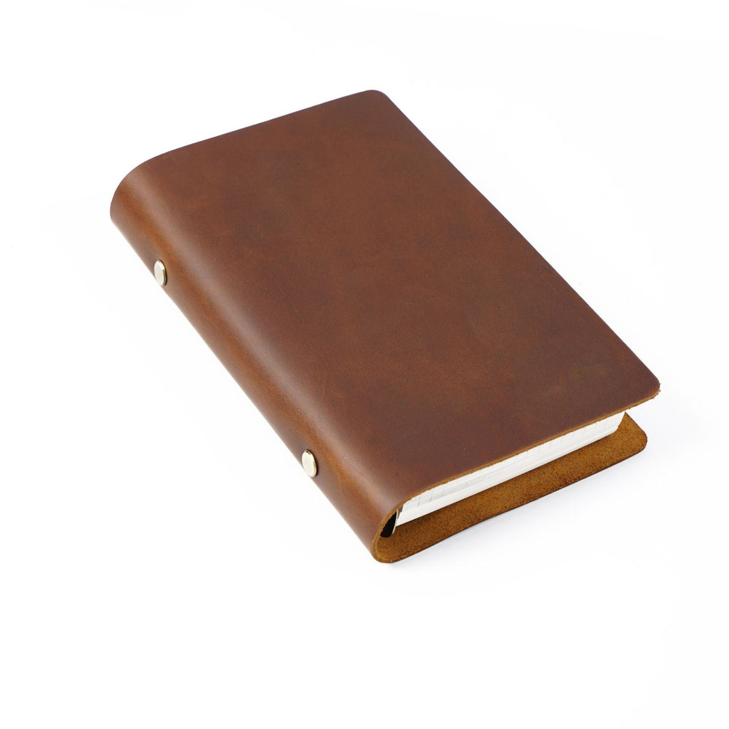Brown crazy horse leather A6 notebook cover with brass ring binder and natural waxed texture.