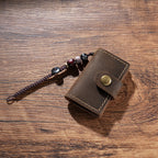 Brown mini leather journal charm with brass snap and beads
