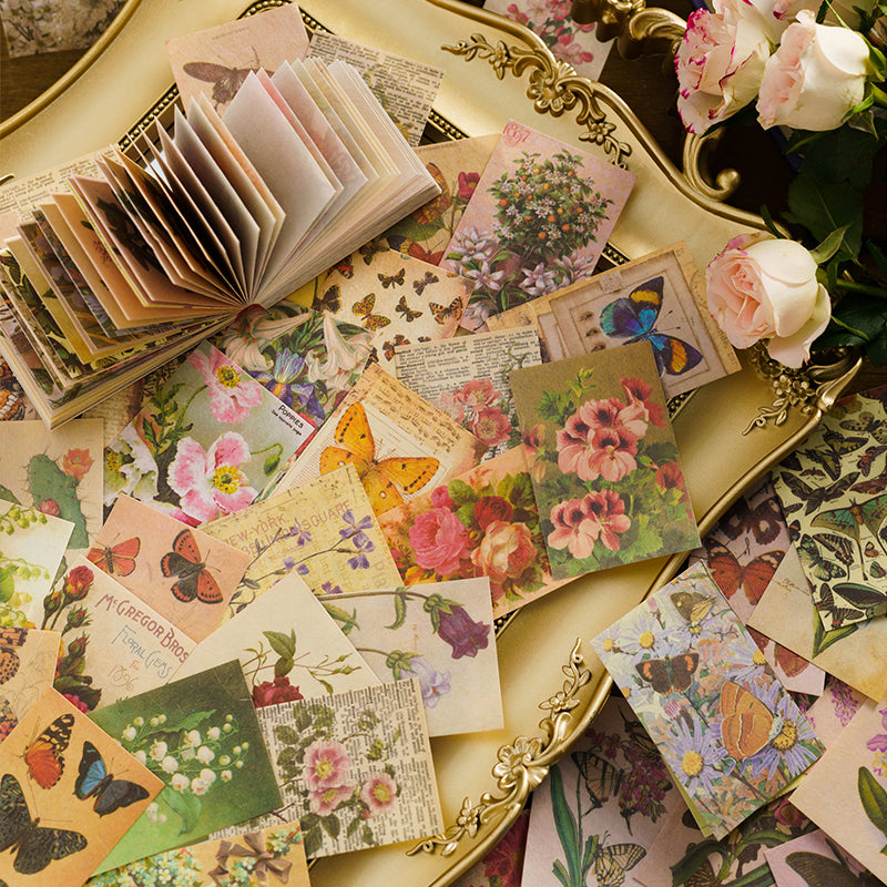 Butterfly and floral mini papers collaged with ephemera