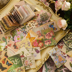 Butterfly and floral mini papers collaged with ephemera