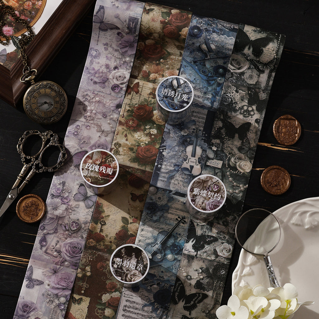 Butterfly washi tape beside pocket watches and dark décor