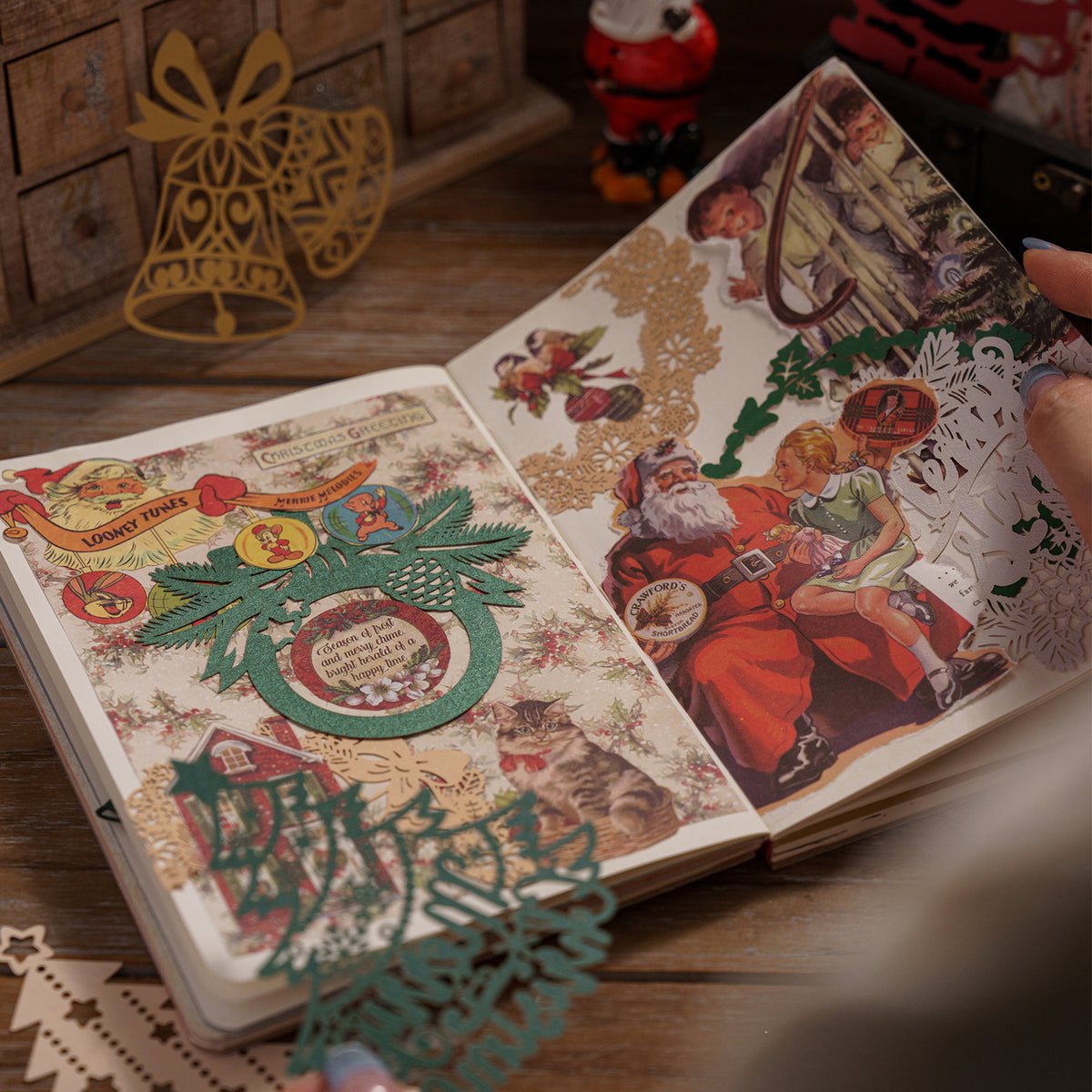 Christmas journal spread with laser cut lace paper ephemera and vintage Santa collage