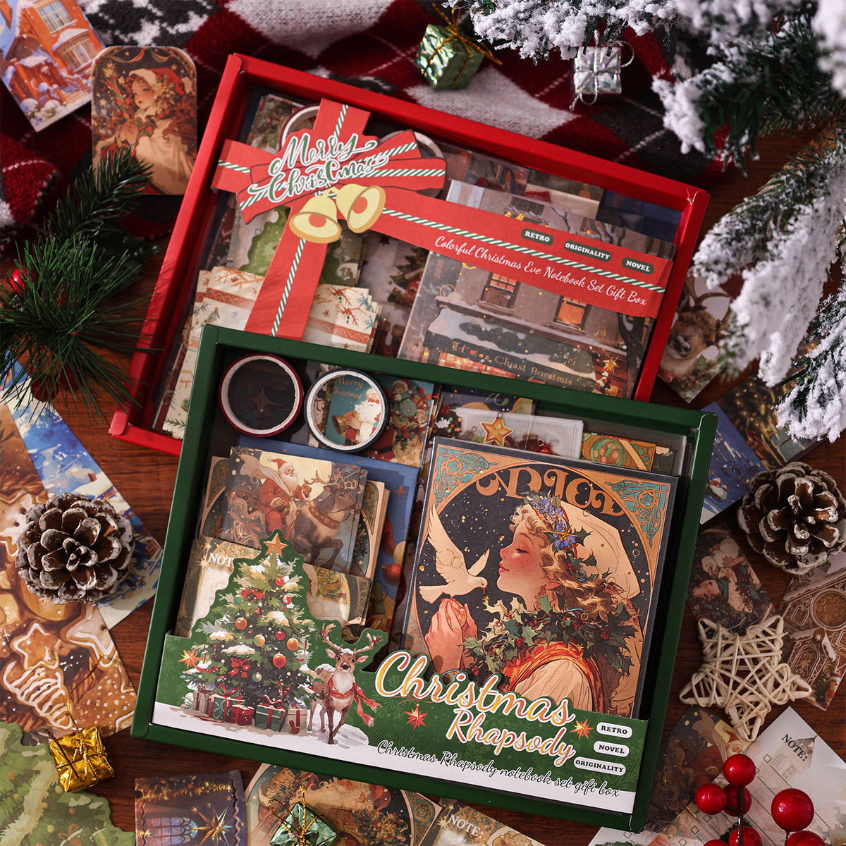 Vintage Christmas ephemera kit in red and green gift boxes with 12 piece mixed sticker and washi set among pine cones