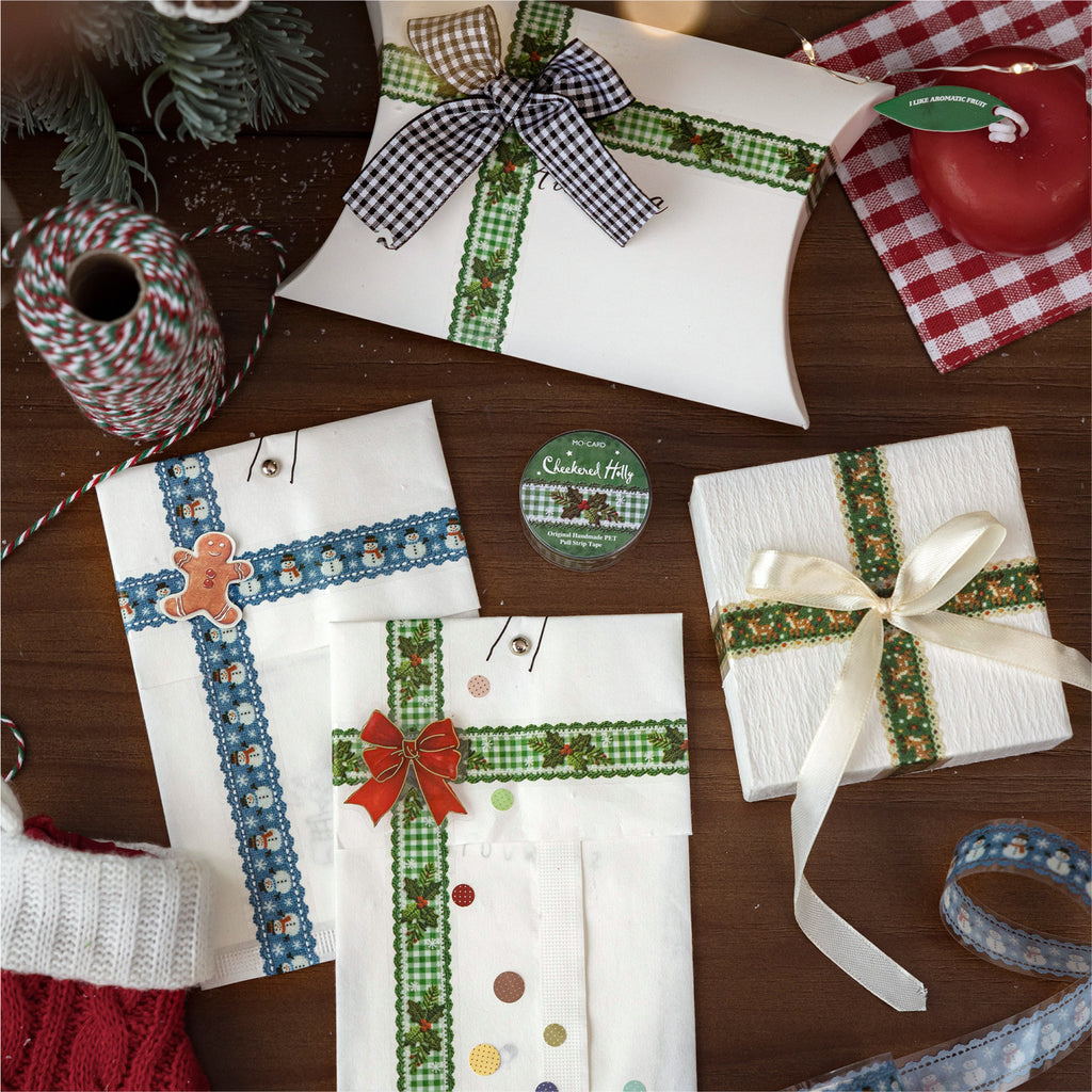 Christmas PET tapes beside gift-wrapped packages with plaid ribbon and wax seals
