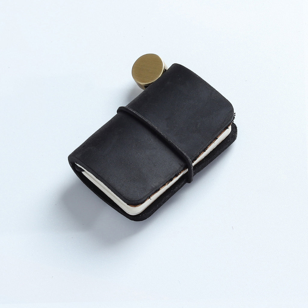 Black crazy horse leather mini traveler's notebook charm with elastic band and vintage metal clasp