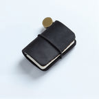 Black crazy horse leather mini traveler's notebook charm with elastic band and vintage metal clasp