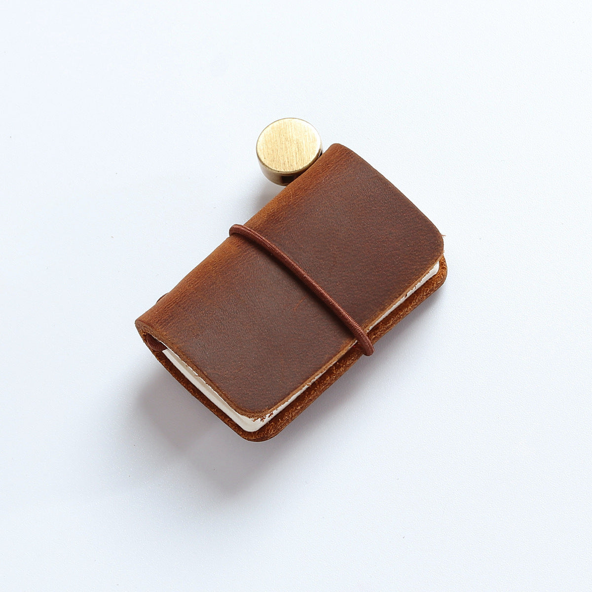 Brown crazy horse leather mini traveler's notebook charm with elastic band and vintage metal clasp