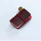 Burgundy crazy horse leather mini traveler's notebook charm with elastic band and vintage metal clasp