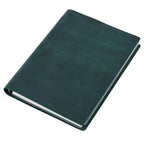 Dark green B5 leather ring binder journal on white background