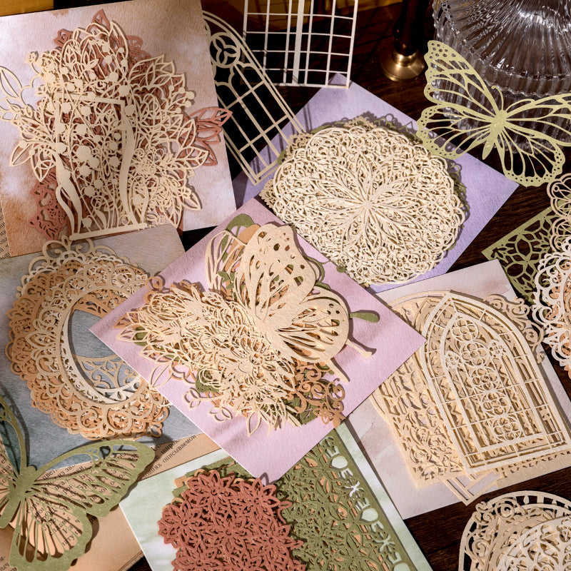 Close-up of die-cut lace stickers showing intricate hollow patterns for scrapbooking and wedding crafts
