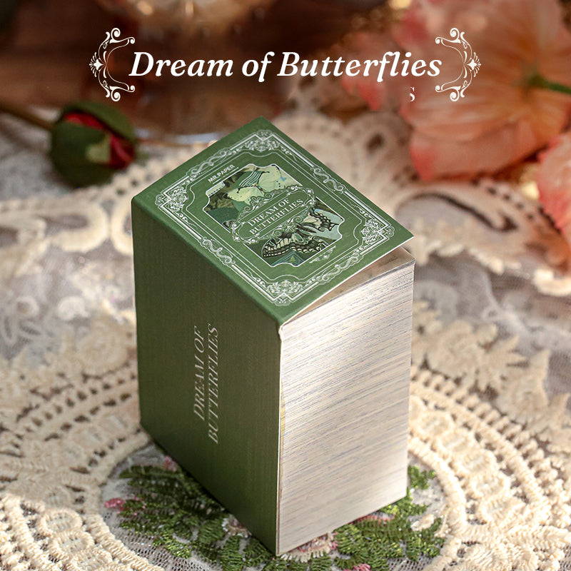 Dream of Butterflies vintage collector's mini ephemera sourcebook with green coated paper cover and matte film finish, 360 sheets of lightweight paper and sulfate overlays for journal collage supplies
