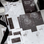 Elegant ephemera pieces applied in journal spread with decorative layering