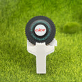 White embossing label maker on grass background