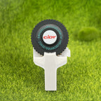 White embossing label maker on grass background