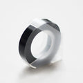 Black embossing tape refill roll for manual label makers
