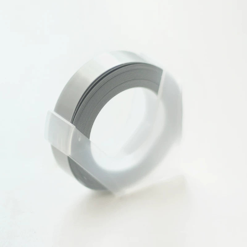 Gold metallic embossing tape refill roll for manual label makers