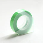 Neon green embossing tape refill roll for manual label makers