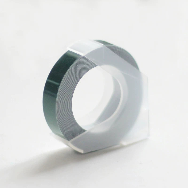 Purple embossing tape refill roll for manual label makers