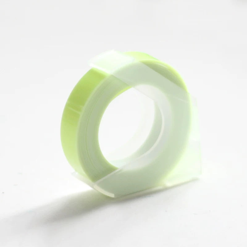 Silver metallic embossing tape refill roll for manual label makers