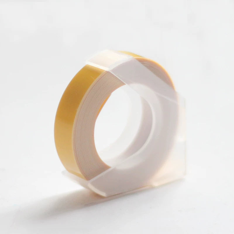 Yellow embossing tape refill roll for manual label makers