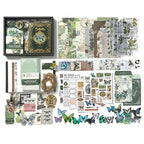 Main image for the 'Emerald Forest' Botanical Green Nature Scrapbook Kit variant, featuring the green butterfly notebook, botanical stickers, vellum papers, and forest aesthetic washi tapes in an open gift box.