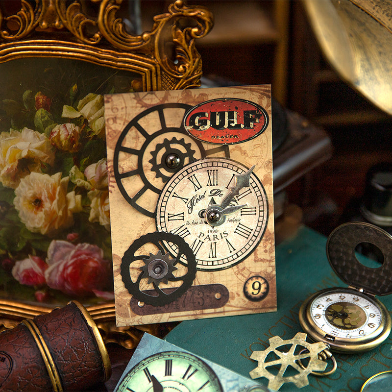 Complete collection of retro clock and Hand holding a fan of 25 assorted vintage industrial gear and timepiece cardstock pieces for journaling