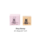 Dozy Bunny beech wood journal stamp with stamped impression of a daydreaming rabbit