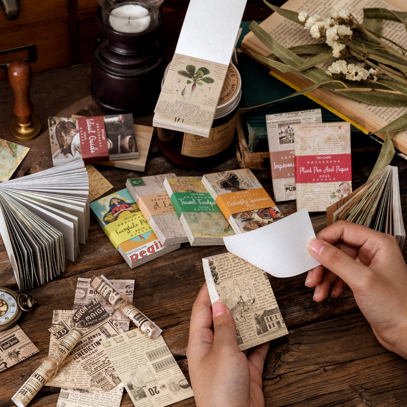Hands flipping through vintage letter papers on a desk