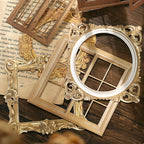 "Close-up of vintage frame window stickers - ornate decorative borders for glass and mirrors"