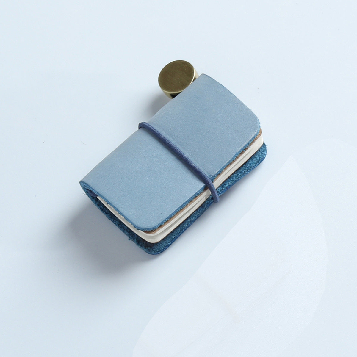 Brown frosted wax leather mini traveler's notebook charm with elastic band and vintage metal clasp