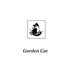 Garden Cat rubber stamp design with a floral kitten among botanical elements, vintage wooden stamp for nature-themed journal pages