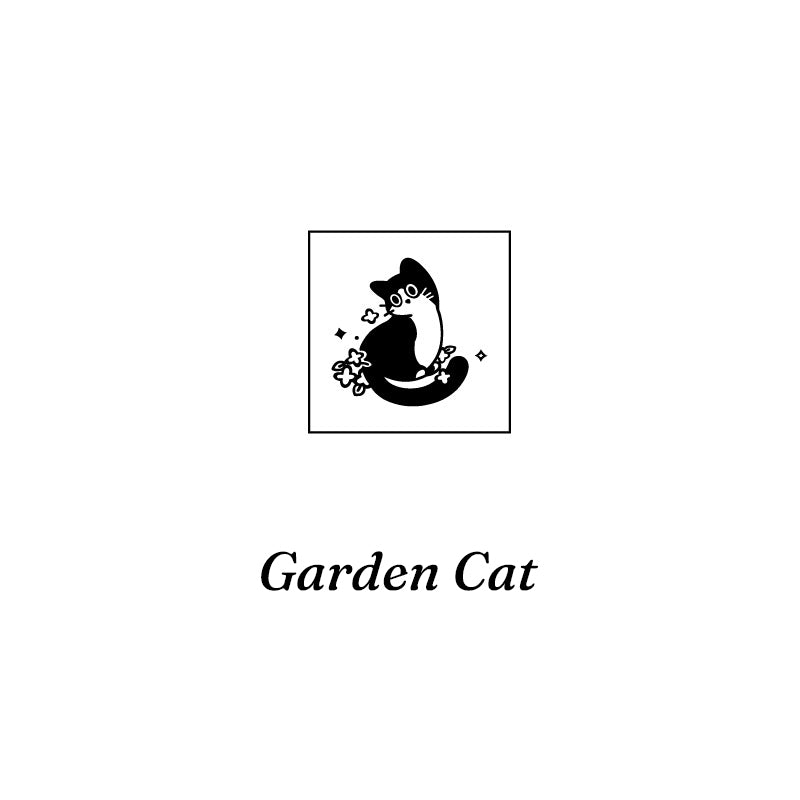 Garden Cat rubber stamp design with a floral kitten among botanical elements, vintage wooden stamp for nature-themed journal pages