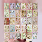 All 30 unique sticker sheets from the second Afternoon Fairy Tales colorway arranged in rows – vintage storybook illustrations