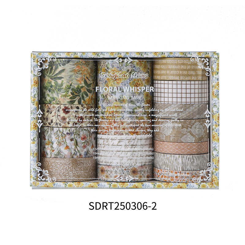 Close-up of Golden Harvest warm earth-tone washi tape rolls, featuring vintage botanical and grid patterns in amber and sepia shades
