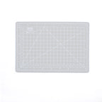 Gray A5 self-healing cutting mat with printed grid and angle guides
