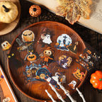 Waterproof PET Halloween stickers arranged on a wooden tray