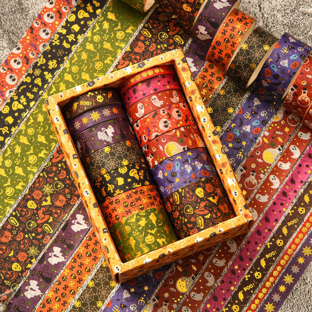 Opened 14-roll Halloween washi tape box with decorative patterned swatches unrolled
